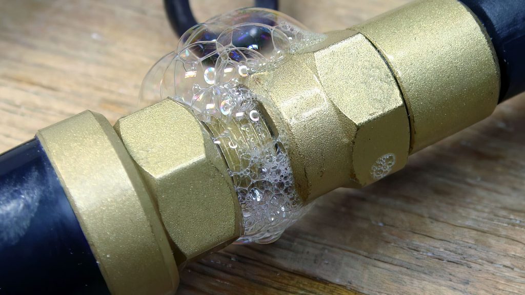 Bubbles on brass fitting joint.